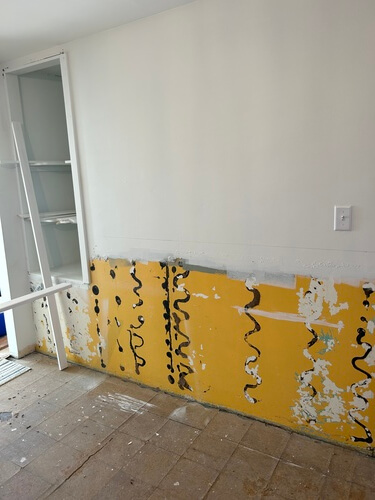 vertical shiplap kitchen back wall before and after white DIY